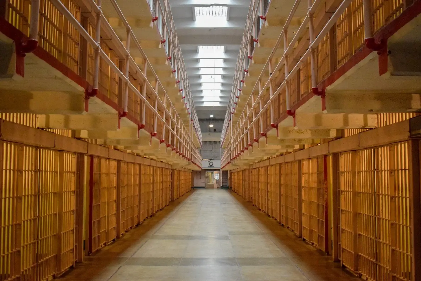 Photo of rows of prison cells.